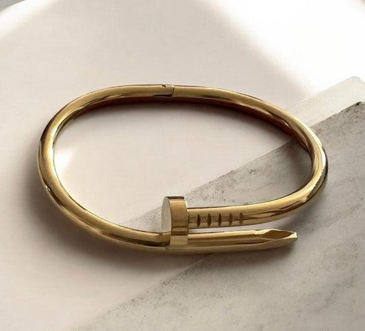 Pulsera clavo dorada